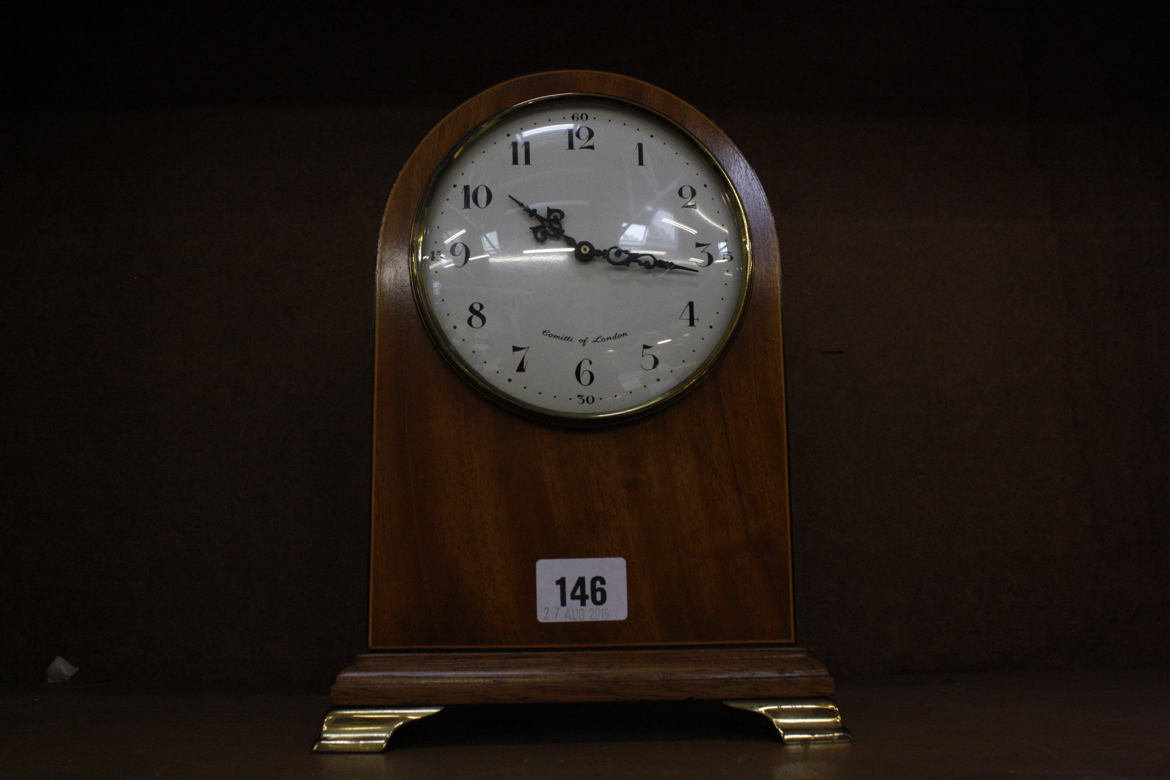 A Comitti of London mahogany mantel clock, 25cm high  Best Bid
