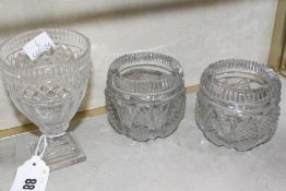 Three items of cut glass, comprising a pair of Regency salts and a rummer with a stepped pedestal