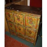 A painted Tibetan cabinet 89cm wide