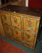 A painted Tibetan cabinet 89cm wide
