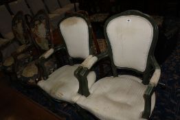 A pair of French 19th Century style fauteuil and a similar pair