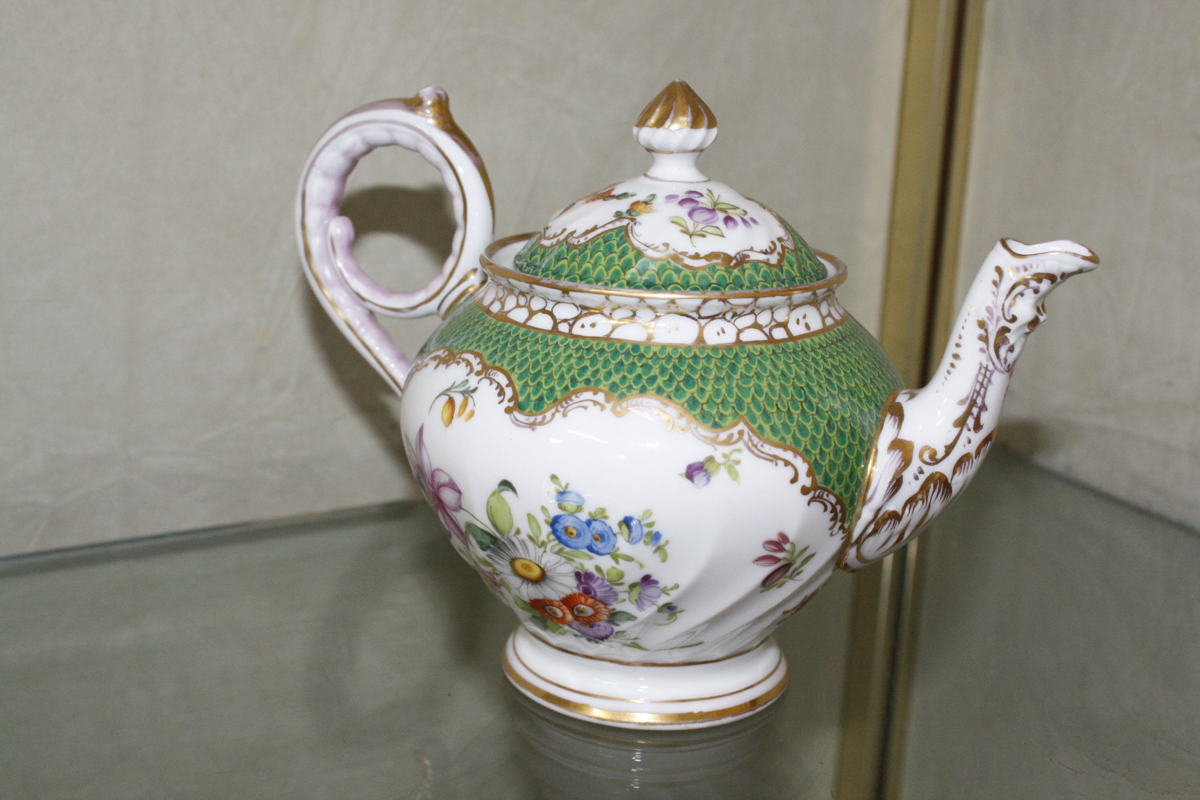 A Dresden teapot, marked to base (af)