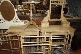 An old pine dressing table, a pine side table, three towel horses and a tripod table.