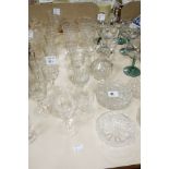 A quantity of clear glass wines, with etched decoration, and other items of glassware