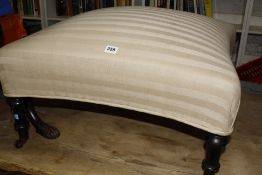 A Victorian upholstered centre stool