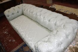 A Victorian buttoned back Chesterfield sofa in pale green damask upholstery.200cm wide