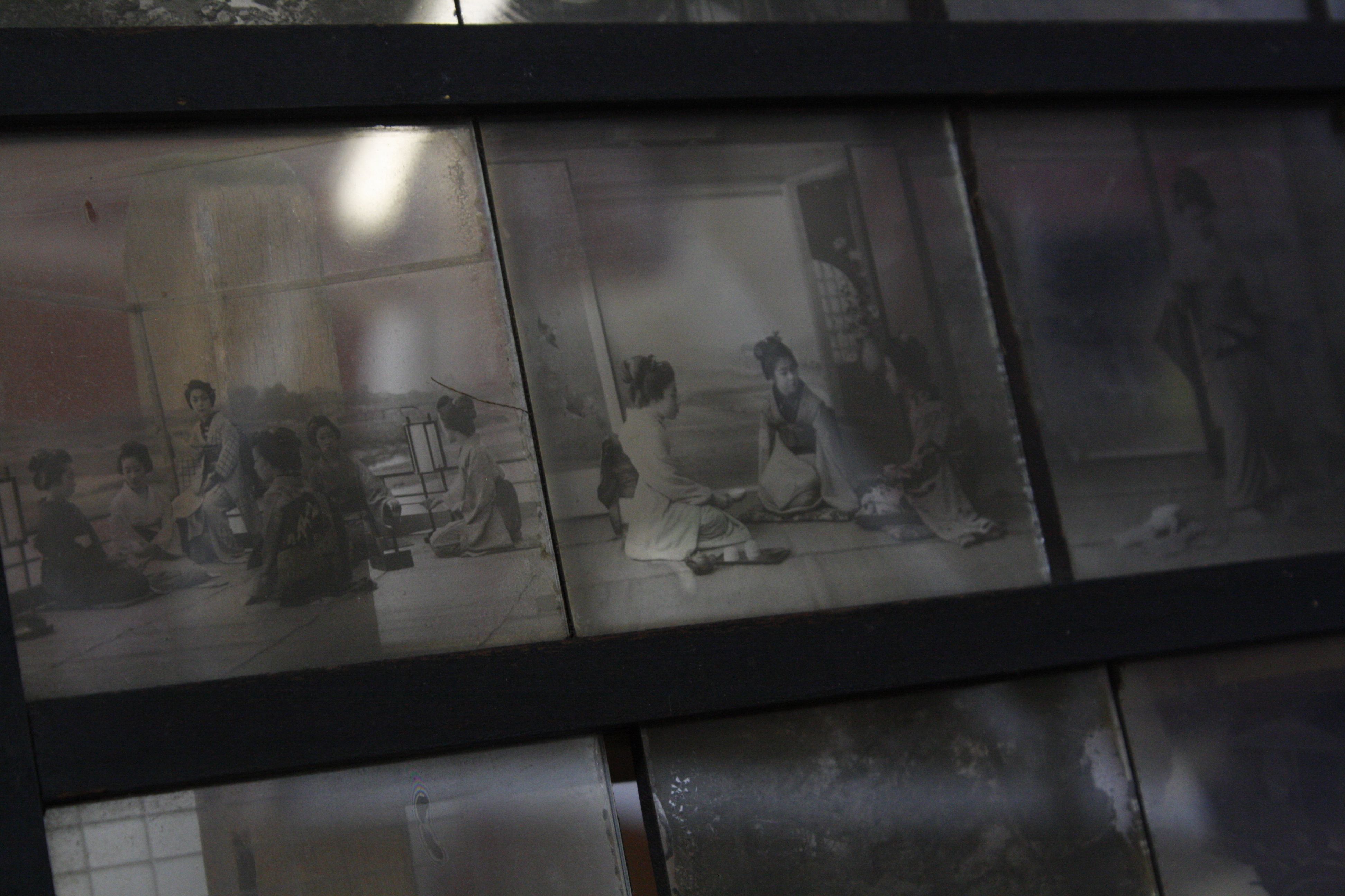 Late 19th Century lantern slides of Japanese interest, in later painted pine frame (24 slides) - Image 2 of 2