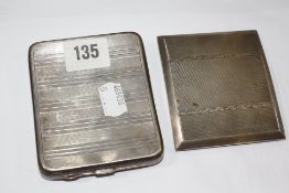 A 1920's silver cigarette case, engine turned, Chester 1927 and another 1920's silver cigarette