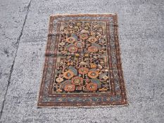 A Persian Toyserkan rug 148 x 101cm