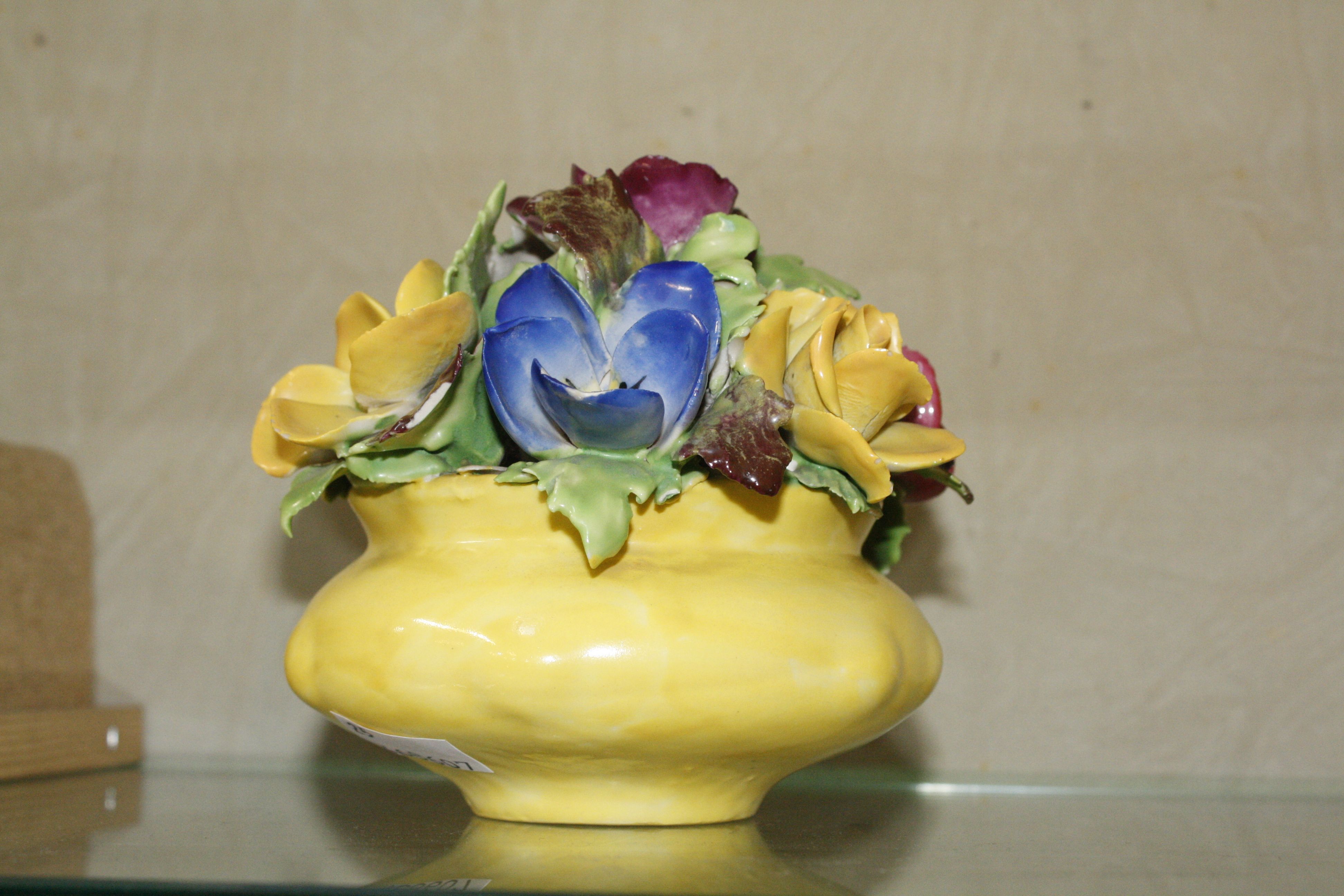 A Wade flower encrusted vase of flowers, 11cm high