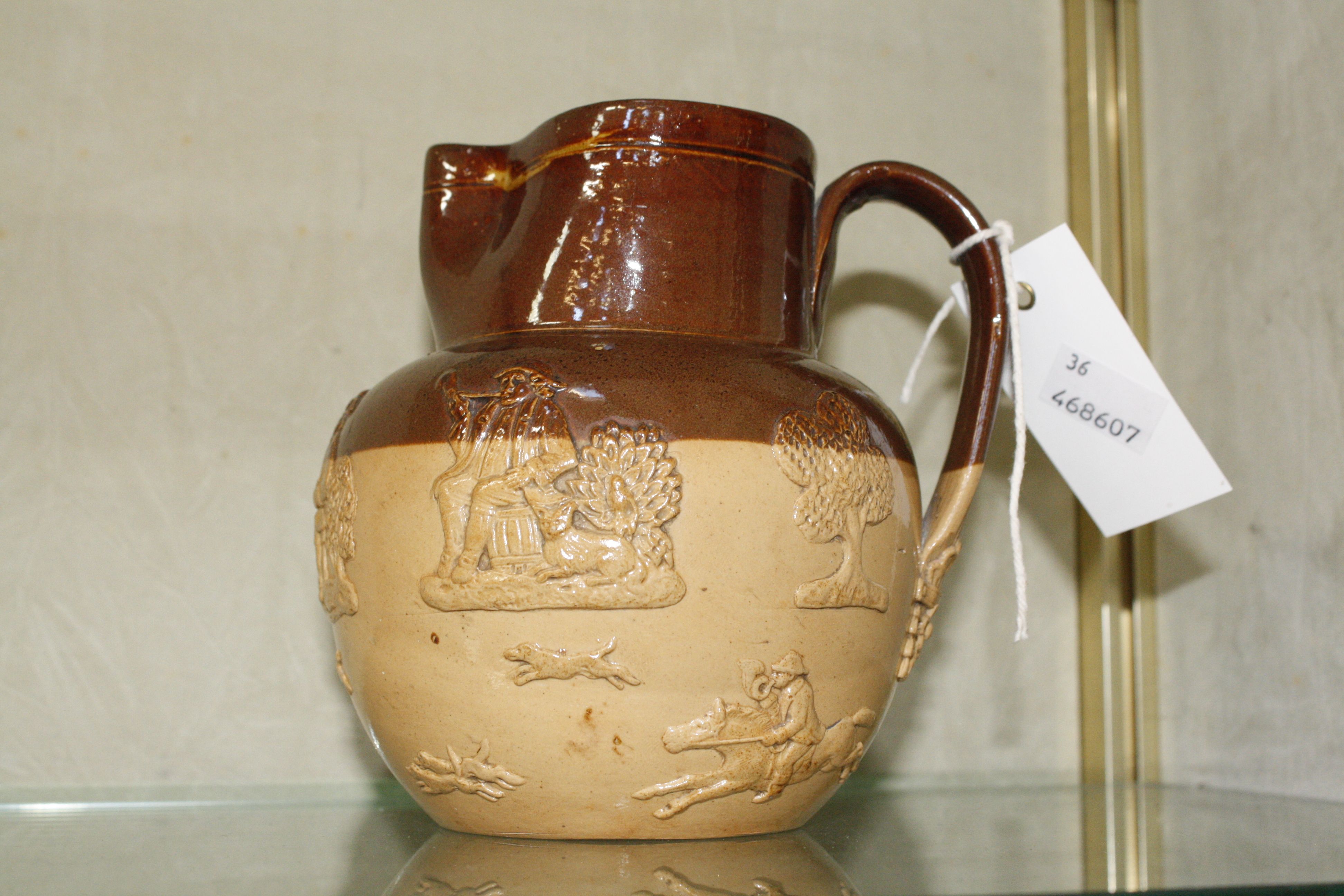A Doulton Lambeth stoneware jug, 15cm high