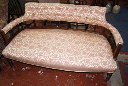 An Edwardian upholstered and mahogany settee,140cm.