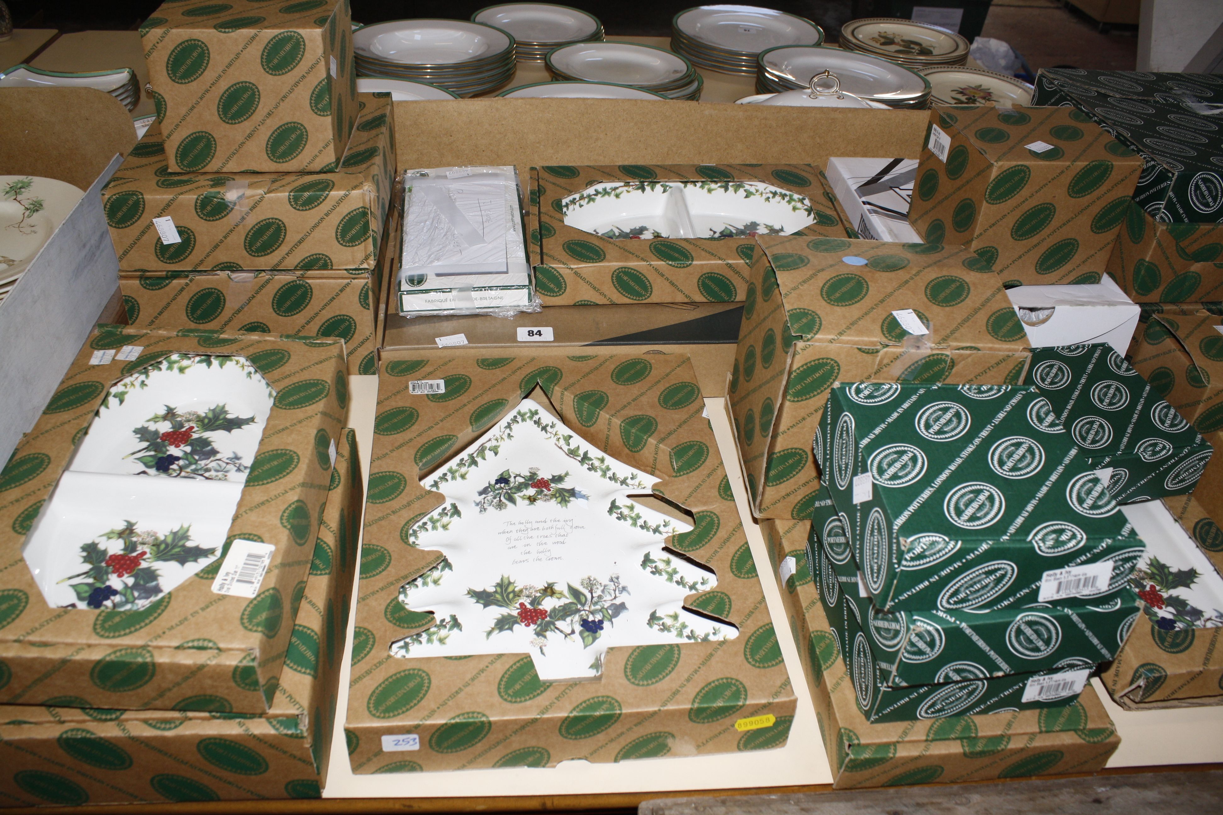 A quantity of Portmeirion 'Holly and Ivy' dinnerware and serving bowls, in original boxes.