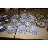 A Royal Worcester Blue Dragon tea service, a Coalport blue and white part tea service, a Dresden