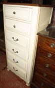 A modern painted chest of six short drawers 138cm high, 66cm wide