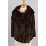 A vintage short fur jacket, by Beatrice   Best Bid