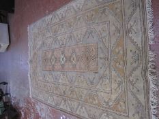 A Turkish style rug 275 x 165cm