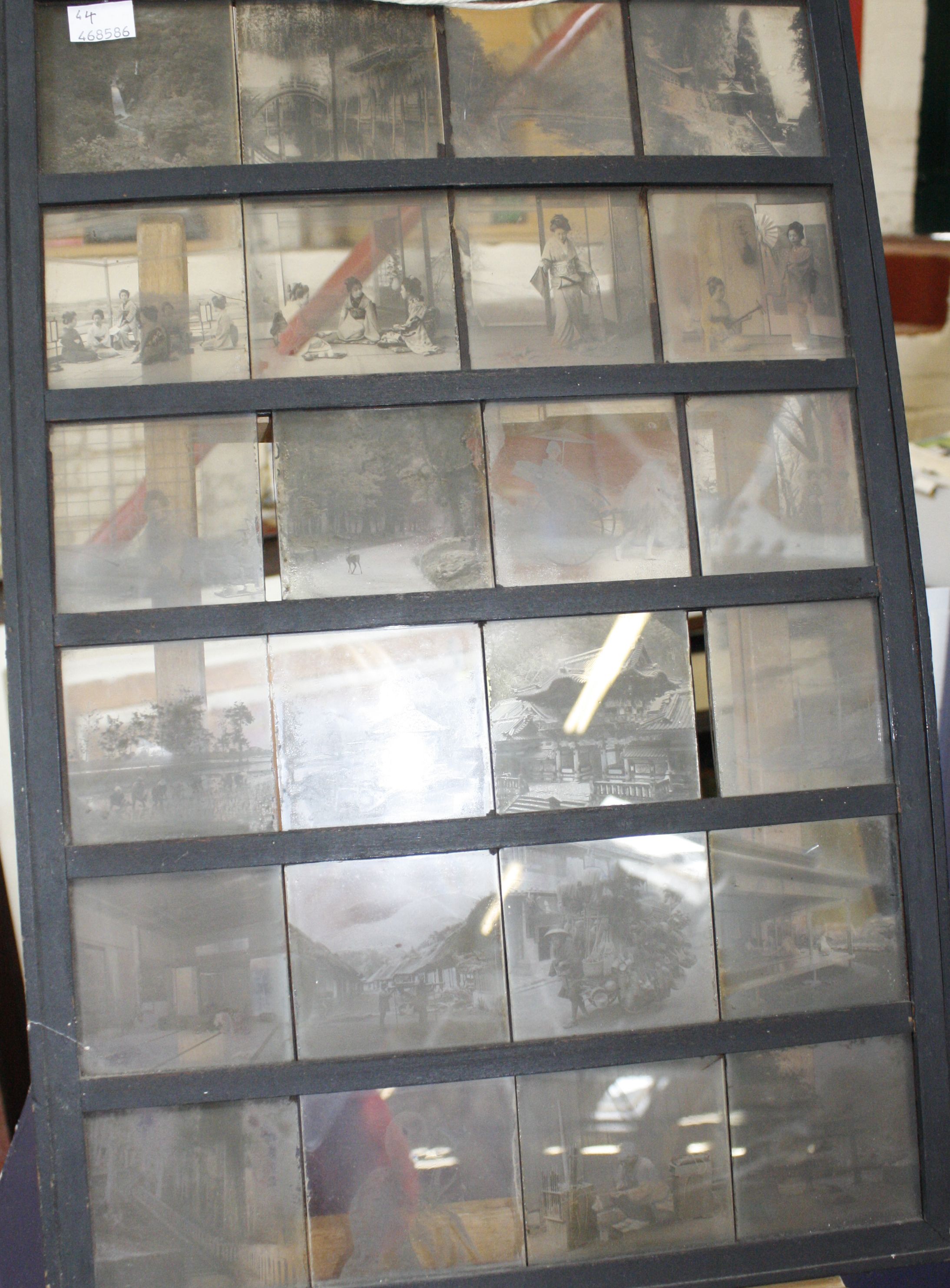 Late 19th Century lantern slides of Japanese interest, in later painted pine frame (24 slides)