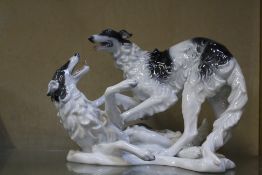 A Rosenthal porcelain group of two Borzoi Dogs playing, printed mark and handgemeitt, impressed