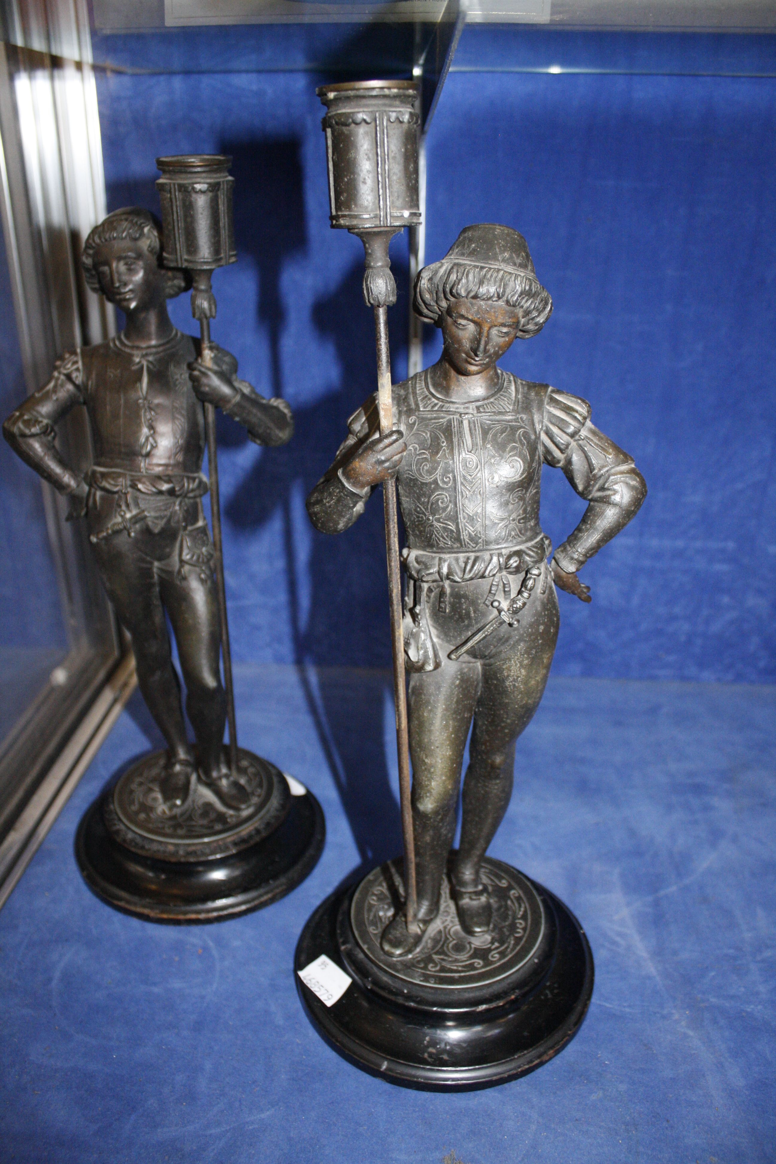 Pair of spelter figural candlesticks, 40cm high