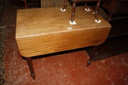 A 19th Century mahogany pembroke table and a two tier mahogany occasional table