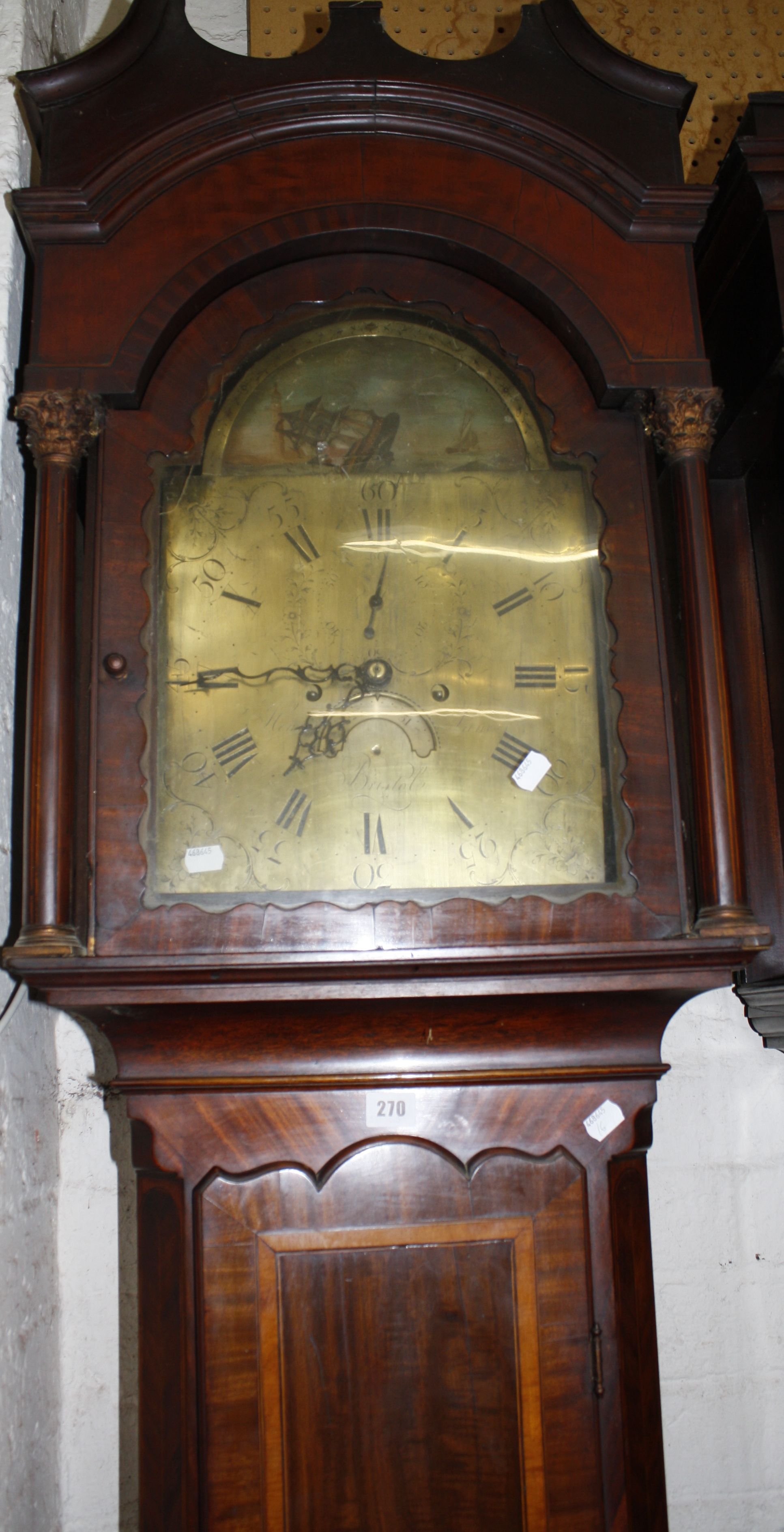 A 19th Century mahogany eight day longcase clock with a brass dial and subsidiary dial 'Henry James'