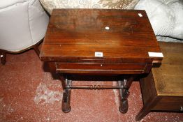 A Victorian rosewood folding combined work and game table