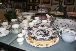 A quantity of ceramics, to include Derby, Minton, Spode, Wedgwood plates, teapots, cake stands and