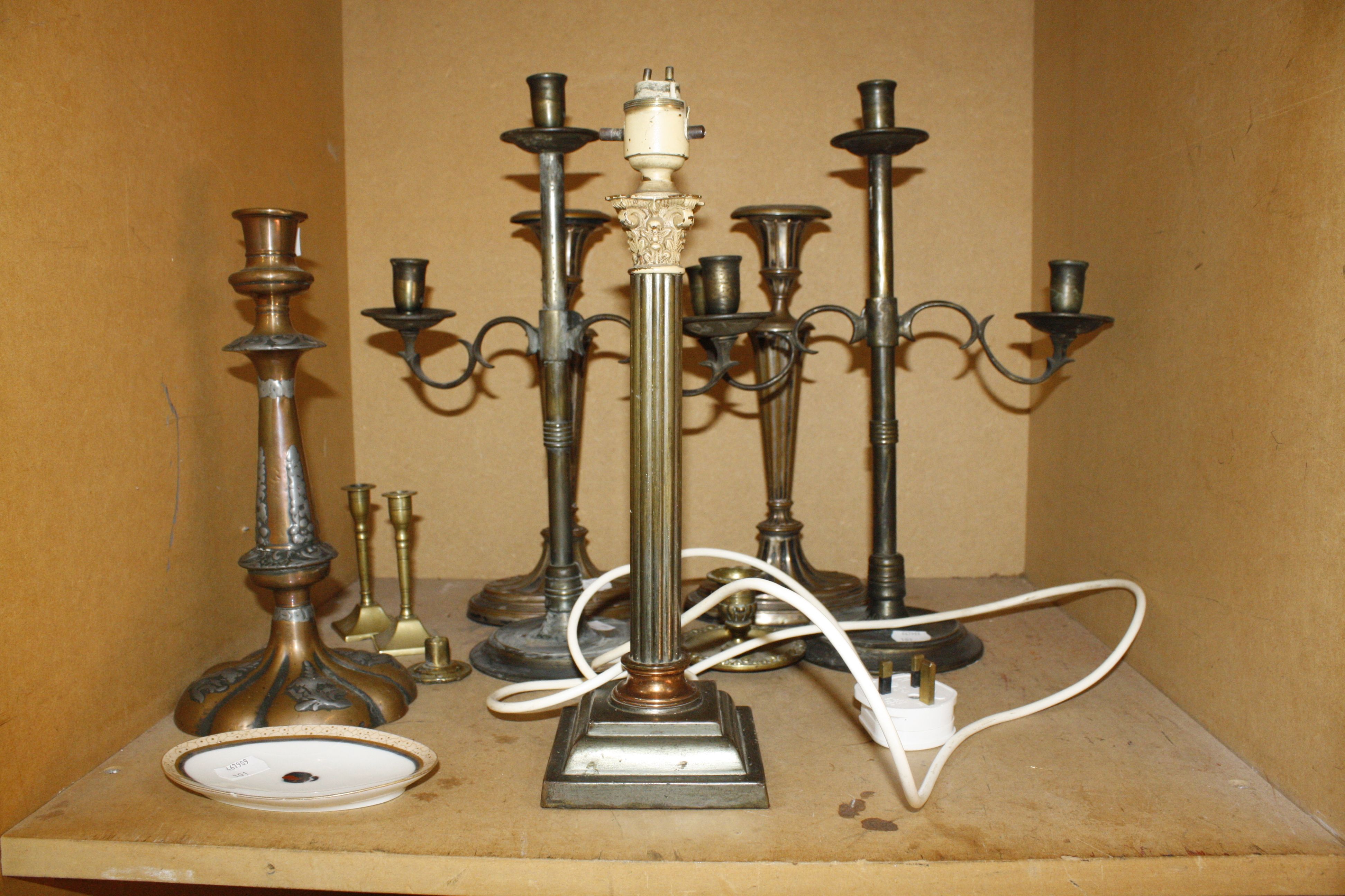 A collection of lighting, including candlesticks, lamps etc (sold as parts)