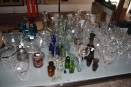 A quantity of glassware to include drinking glasses and decanters, Mdina glass vases, a part liqueur