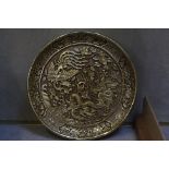 A cinnabar lacquer dish with a dragon and a phoenix, now painted gold, 20cm, Ming mark