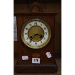 A 19th century French oak cased mantel clock