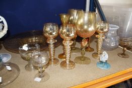 A large assortment of mostly later Venetian (Murano) glass including goblets, tazzas, jugs and vases