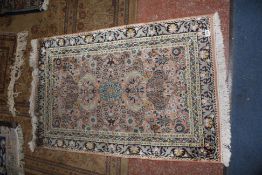 An Isfahan rug 101 x 70cm together with six further rugs