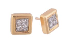A pair of 18 carat gold and diamond earstuds by Kutchinsky, the square panels set with four