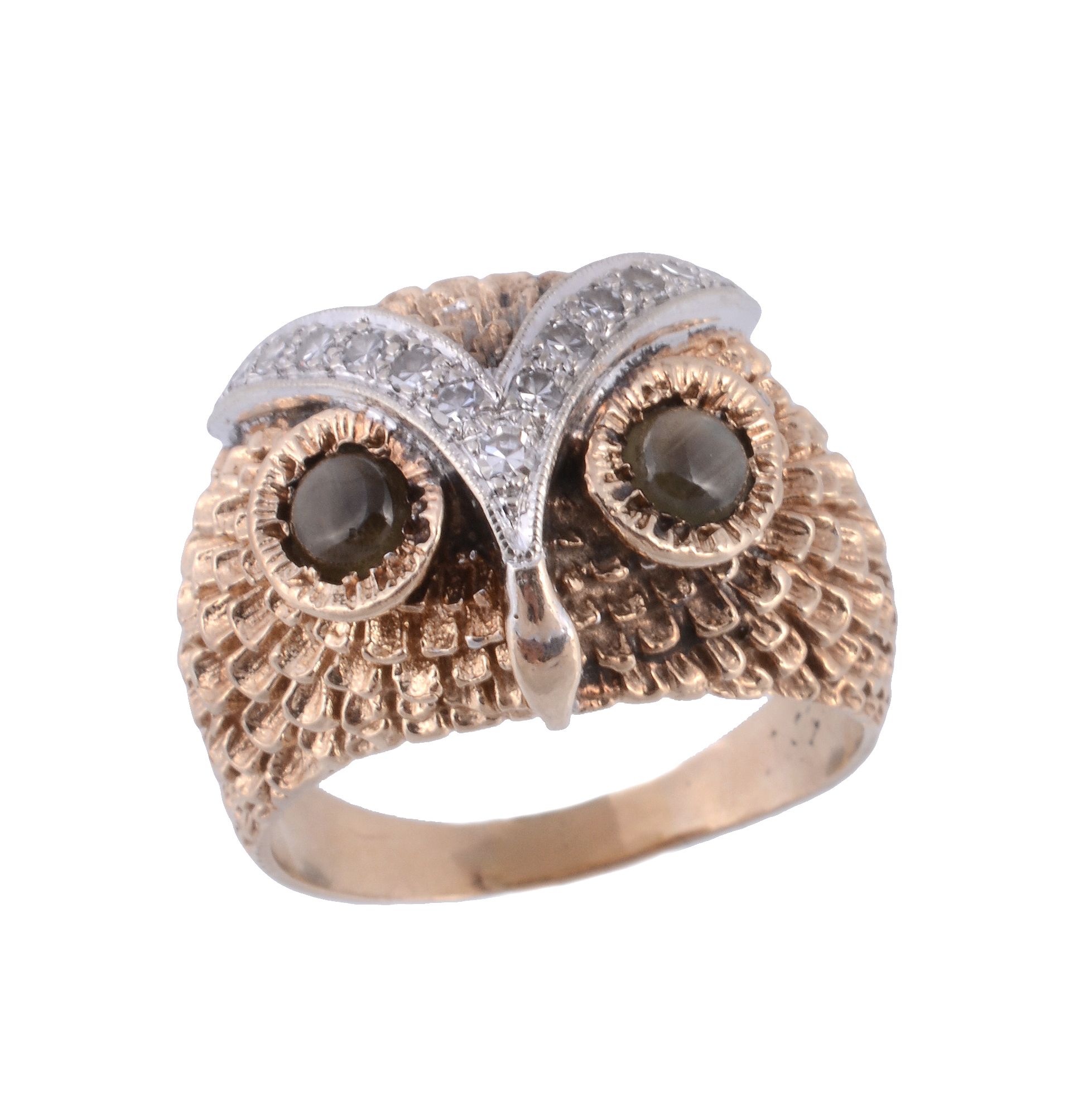 An owl ring, designed as an owl's head, with textured feathers and circular shaped labradorite to