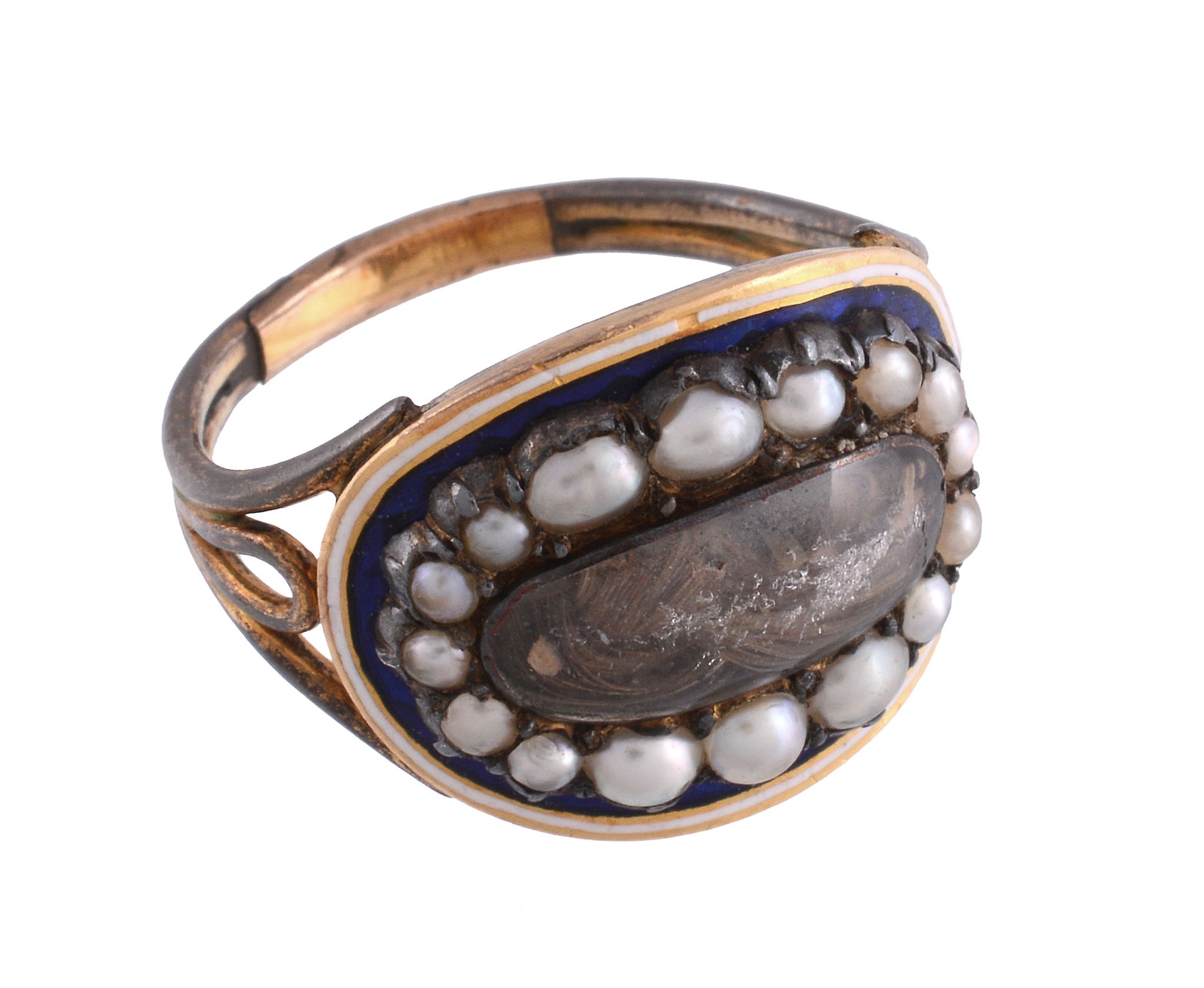 A mourning ring, the central glazed panel with hairwork beneath, within a surround of pearls to a