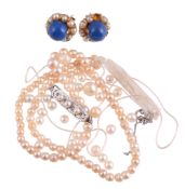 A strand of pearls, composed of graduated pearls on a string; loose cultured and simulated pearls;