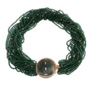 An aventurine quartz and nephrite necklace, the polished aventurine quartz beads to a pierced
