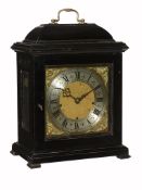 A William III style ebonised quarter-chiming table clock The movement signed for Jenner and