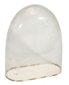 A glass mantel clock dome Probably French, 19th century  The base with rounded ends 37cm (14.5ins)