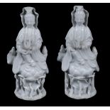 A pair of small Dehua figures of Guanyin, Qing Dynasty  A pair of small Dehua figures of Guanyin,