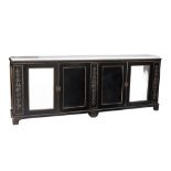 A French ebonised and gilt metal mounted side cabinet , early 19th century  A French ebonised and