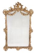 A Continental carved giltwood and composition wall mirror, circa 1900  A Continental carved giltwood