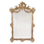 A Continental carved giltwood and composition wall mirror, circa 1900  A Continental carved giltwood