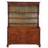 A George III oak dresser , circa 1760, probably North Caernarfonshire  A George III oak dresser  ,