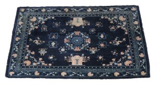 A Chinese rug , approximately 180cm x 255cm  A Chinese rug  , approximately 180cm x 255cm