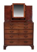 A George III mahogany dressing chest , circa 1780, of campaign type  A George III mahogany