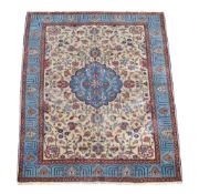 A Tabriz carpet, approximately 313 x 212cm  A Tabriz carpet,   approximately 313 x 212cm