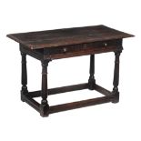 A Charles II oak side table , circa 1660, the rectangular top above frieze...  A Charles II oak side